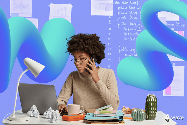 A professional woman sitting at her desk, talking on the phone